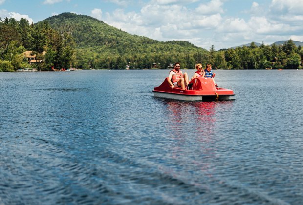 Enjoy watersports like pedal boating during your weekend getaway at High Peaks Resort in Lake Placid