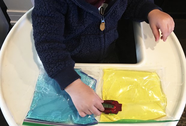 Turn a Highchair into a Baby Activity Center: A fantastic use for old hair gel.