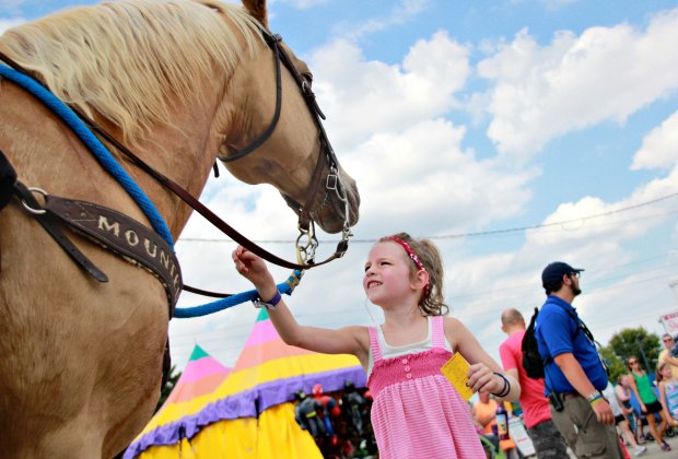 Milwaukee Family Travel Guide Explore the Wisconsin State Fair for classic family fun in Milwaukee. Photo courtesy of the fair.