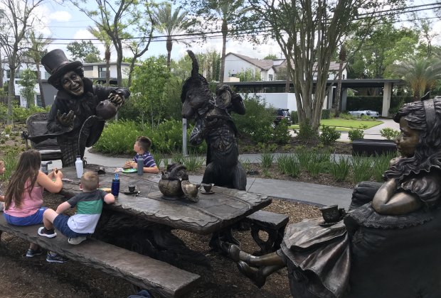 Picnicking at the "Move One Place On" sculpture in Evelyn's Park.