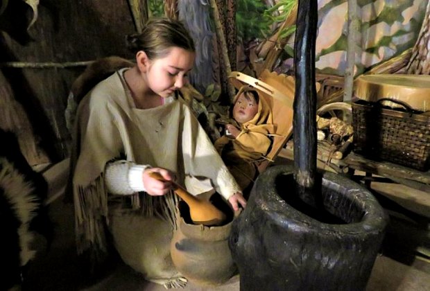 Image of child learning traditional Native American culture in CT.