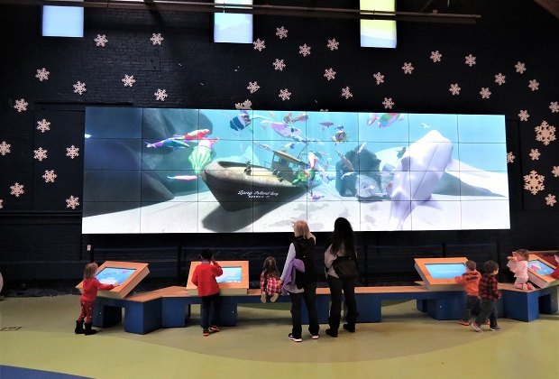 Photo of children at interactive station in Maritime Aquarium.