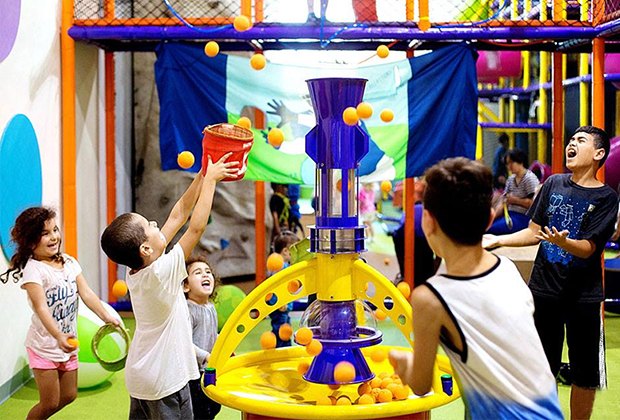 Catch the foam balls at Jumpin' Jax indoor play space in Paramus