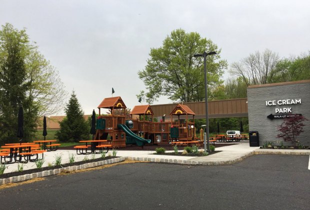 Playground and outdoor dining area at Char Burger