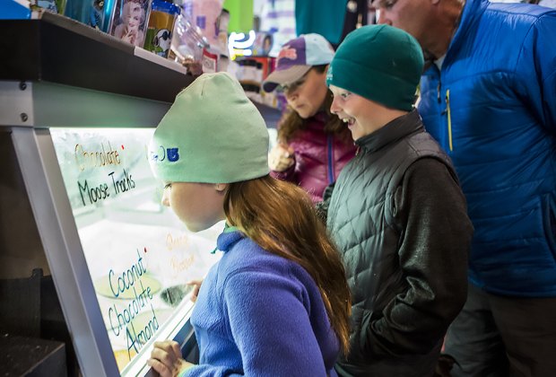 Emma's Lake Placid Creamy kids looking at treats  Things to Do in Lake Placid on a Winter Vacation Status message