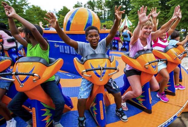 Photo of kids on a ride at New England theme park