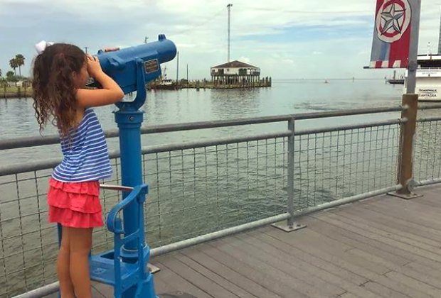 Coin-operated telescopes line Kemah's boardwalk.