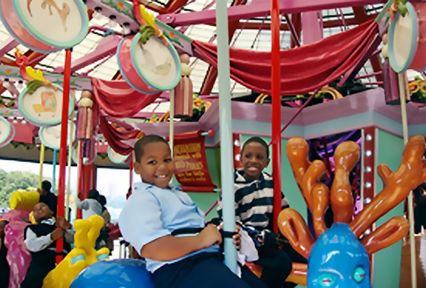 NYC's Best Parks and Playgrounds for Kids Birthday Parties: Totally Kid Carousel at Riverbank State Park.