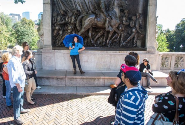 Photo of tour in front of the Massachusetts 54th memorial in Boston.