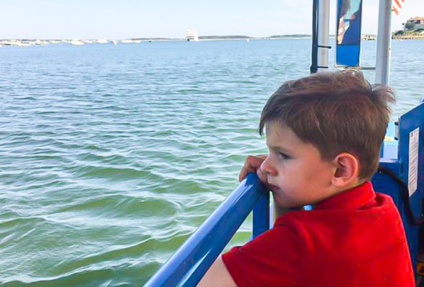 Photo of child on a Cape Cod boat- Budget Weekend Getaways