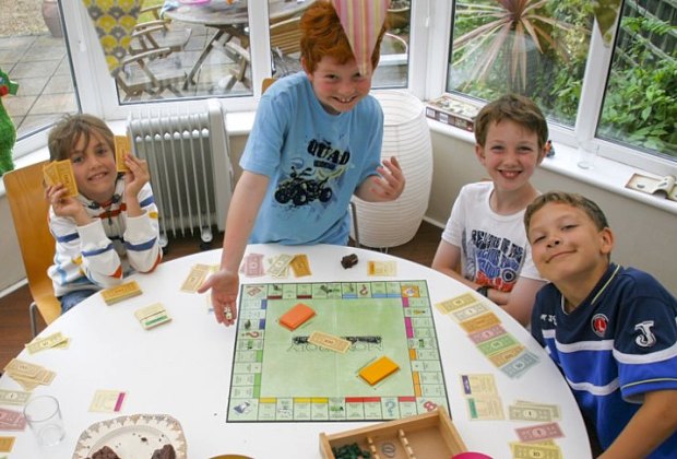 Kids play Monopoly Holidays & Activities for November 2024 Play Monopoly Day