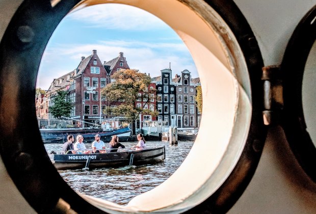 Stay on a Houseboat in Amsterdam for a Total Family Vacation Win Unique views are given when your family rents a houseboat for the night.