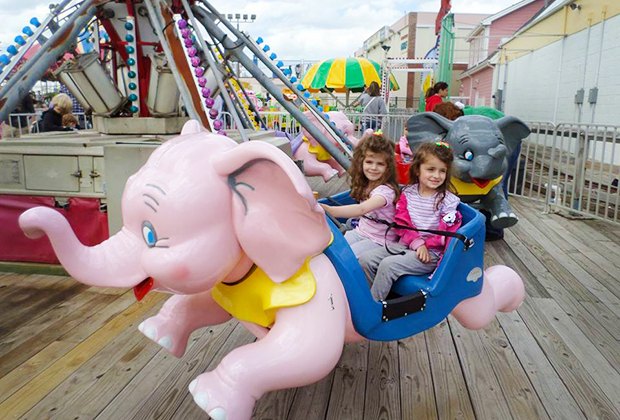 kids on an amusement park ride