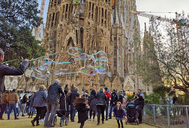 Barcelona Family Travel Guide Tour Sagrada Familia in Barcelona and discover countless symbols that Gaudí scattered in his most famous piece of architecture. Photo by Anna Fader
