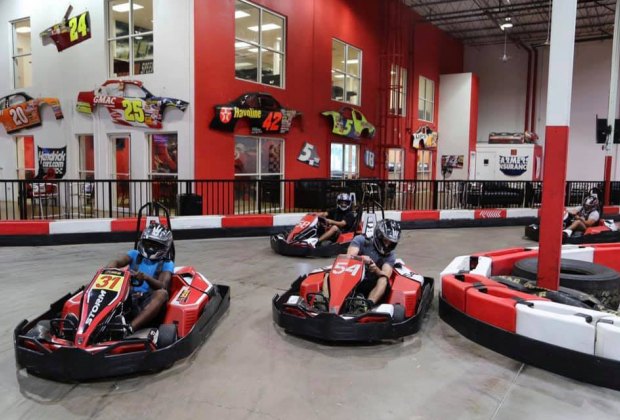 kids drive at an indoor grand prix