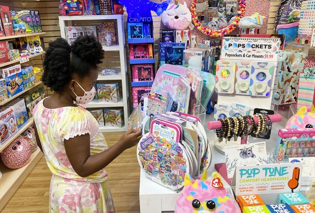 Girl peruses the toys at Learning Express in Verona, New Jersey