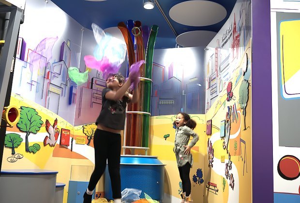 Girls play indoors at CMOM's Superpowered Metropolis