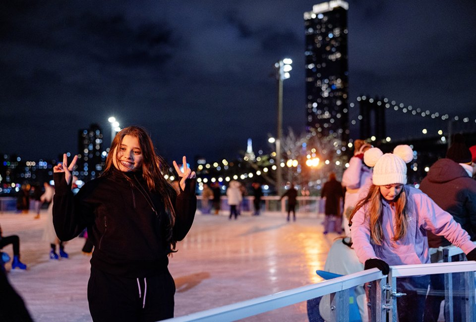 Roebling Rink at Brooklyn Bridge Park welcomes visitors to skate under an NYC landmark.