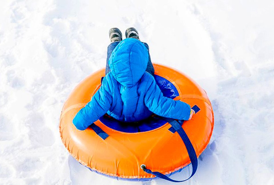 Snow tubing is a favorite winter activity in Chicago. Photo courtesy of Canva