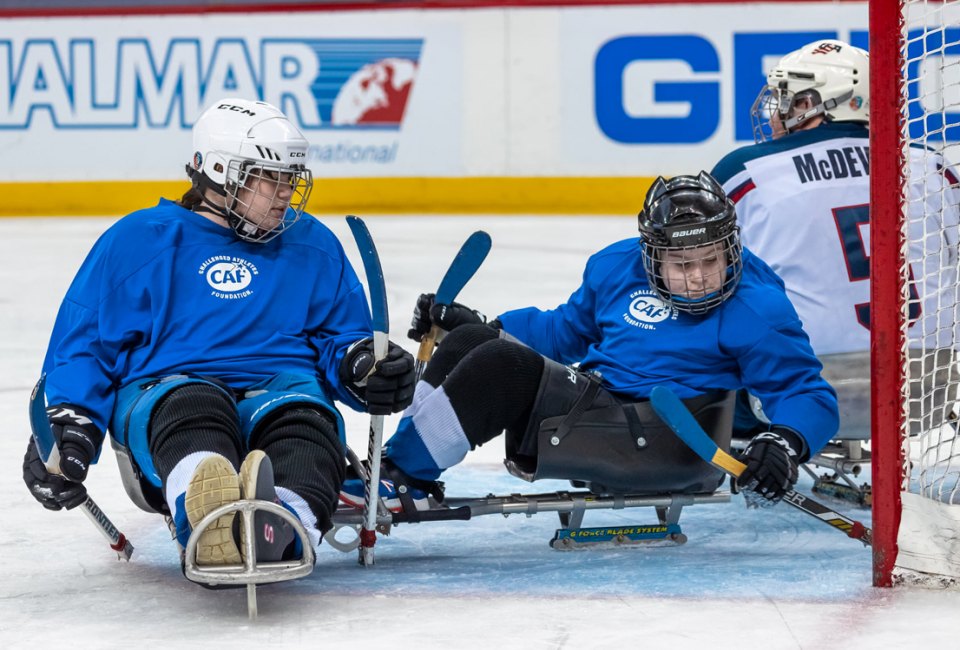 Hammerheads sled hockey players in action. Photo courtesy of Hammerheads Sled Hockey