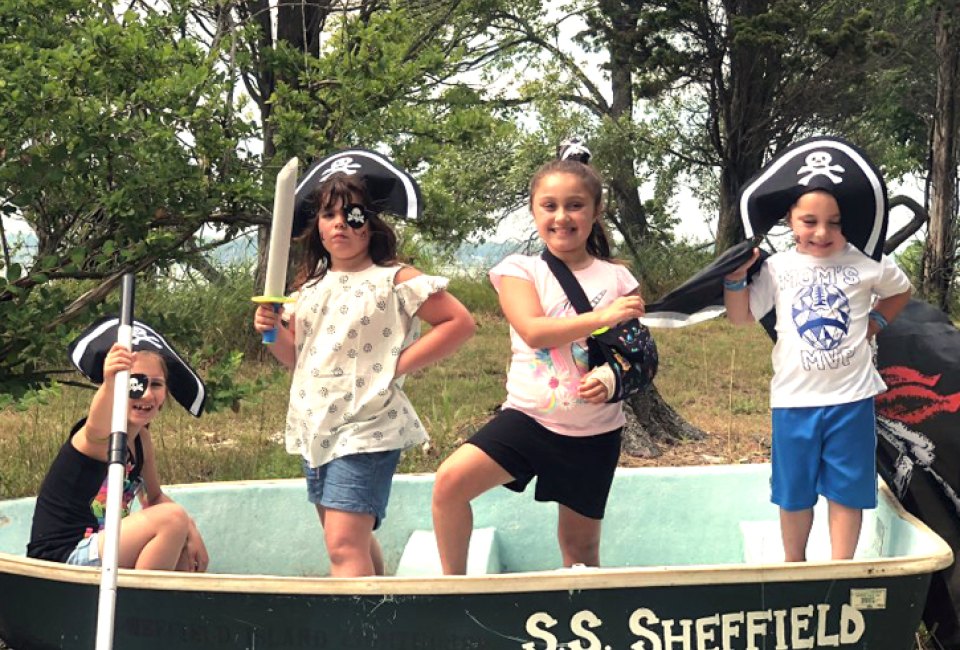 Foam swords, pirate hats, and any boat =  Piurate Party in the backyard! 