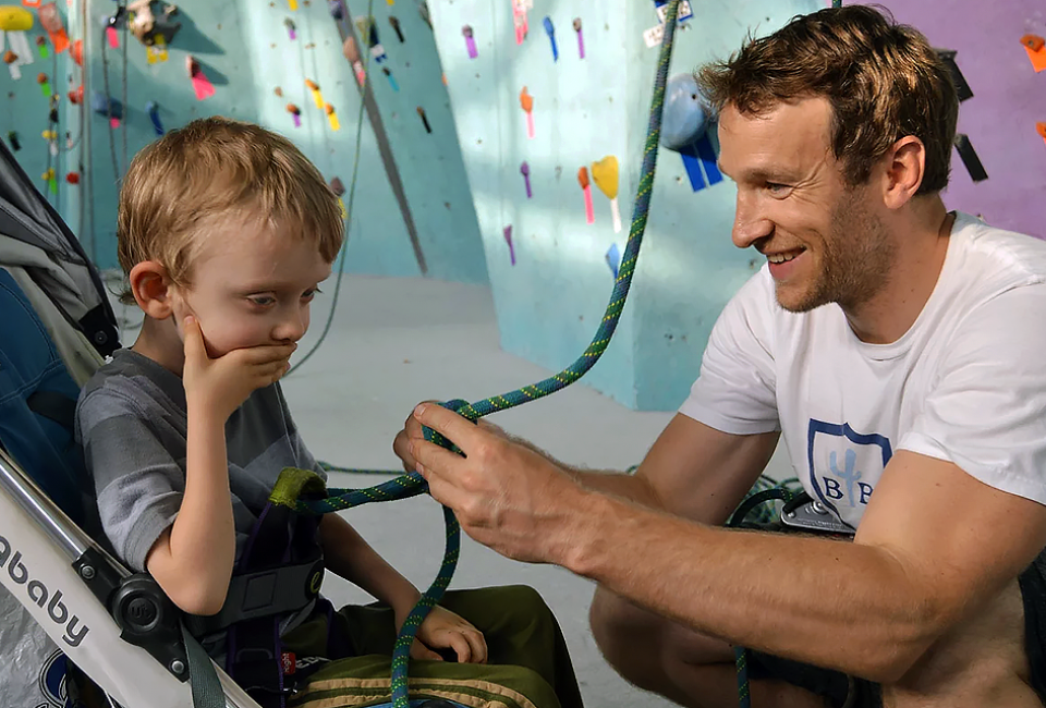 The Adaptive Climbing Group introduces kids of all ages to the adventure of rock climbing with its unique special needs program. Photo courtesy of the group