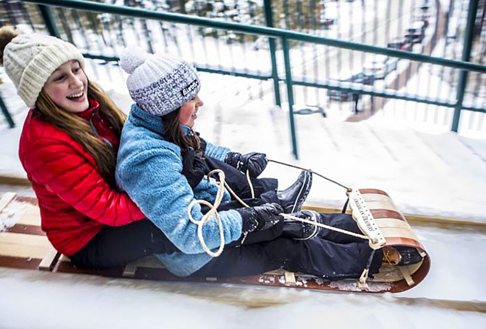 Open only in the winter, Lake Placid’s Toboggan Chute is a 30-foot high structure that sends toboggans down an ice-covered chute onto the frozen Mirror Lake. Photo courtesy of Lake Placid, Adirondacks, USA