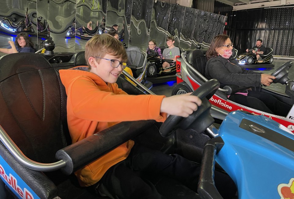 Ride the bumper cars at Adventureland