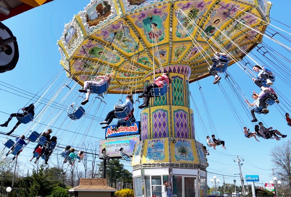 The Wave Swing is one of the first rides you see when you enter Adventureland Amuseument Park