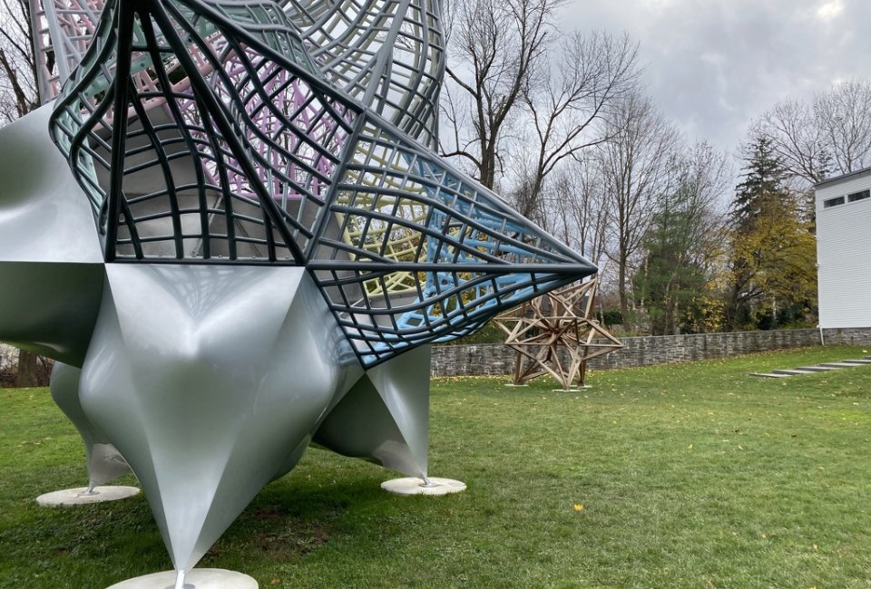 Enjoy outdoor art, like Frank Stella's Stars at the Aldrich. Photo by Ally Noel