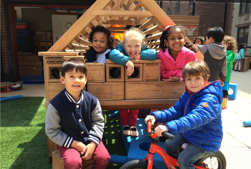 Preschoolers at All Souls get plenty of play time to romp on the rooftop playground. Photo courtesy of the school