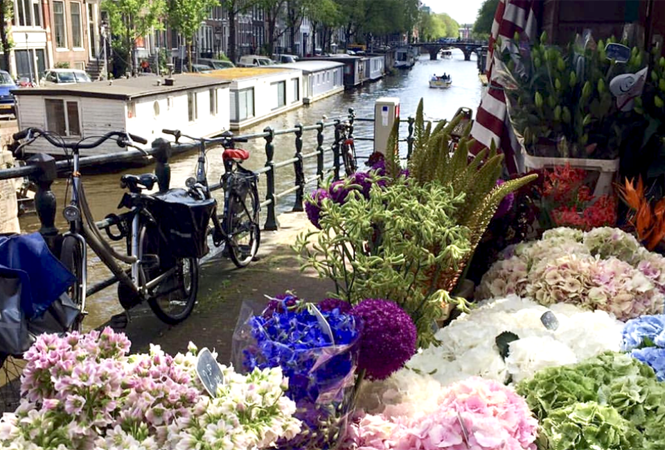 Amsterdam is famous for its flowers and canals. Photo courtesy of i amsterdam
