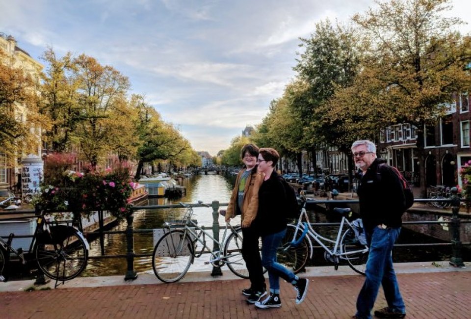 Stroll past Amsterdam's pretty canals on a family vacation to the Dutch city