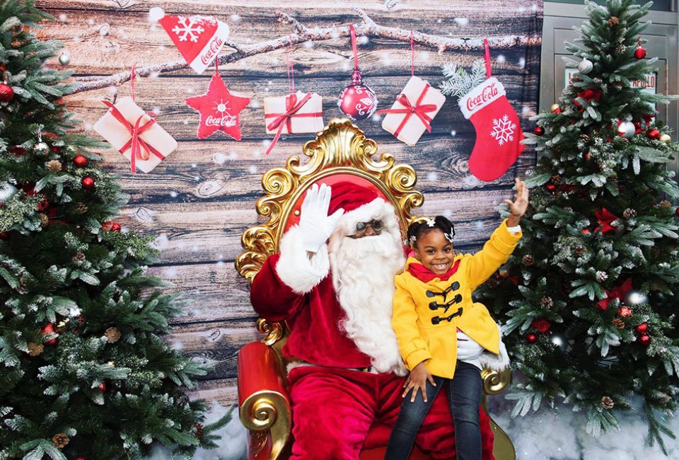 Under the twinkling lights of the famous marquee, The Apollo Theater hosts holiday-themed activities for families. Photo courtesy of the theater