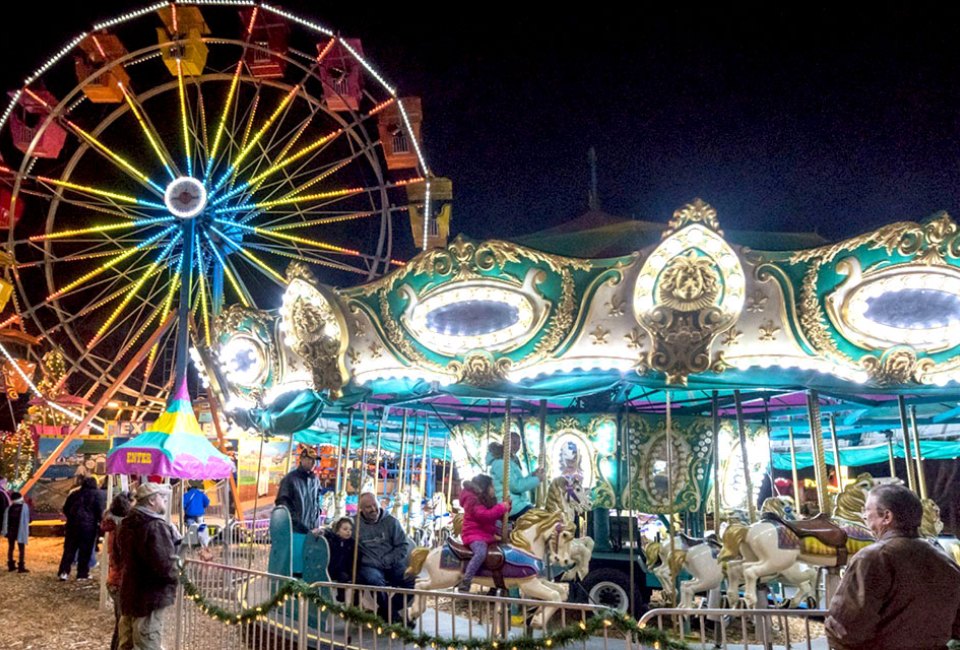 Families will enjoy exciting rides, interactive games, and of course, delicious food at the Atlanta Fair. Photo courtesy of the fair