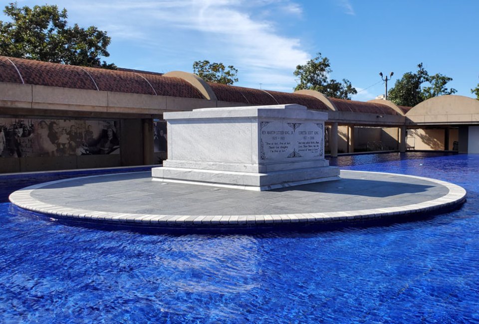 The tombs of Martin Luther King Jr. and Coretta Scott King and the reflecting pool are part of the King Center at the Martin Luther King Jr. National Historic Park.