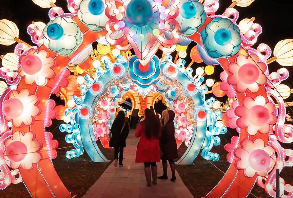 Witness interactive light swings, tunnels, and magical creatures composed of artisan lanterns at the Winter Lantern Festival. Photo courtesy of the festival via Fever