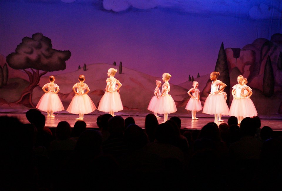The highlight of Atlanta dance classes for kids is the elaborate recital production. Photo Mommy Poppins