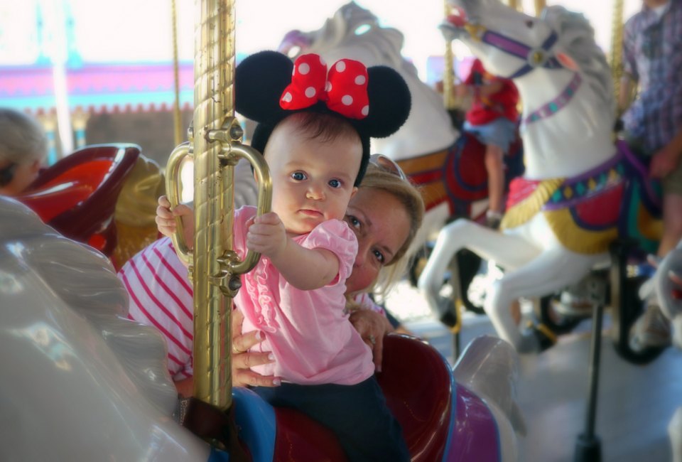 Have a memorable day at the most magical place on earth with a baby. Photo by Eduardo Merille/CC BY 2.0