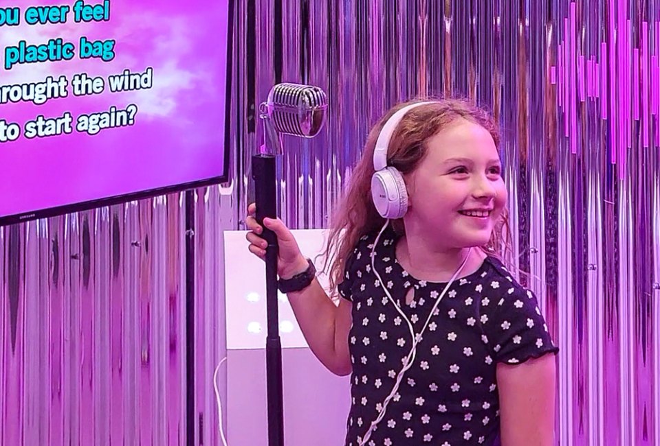 Karaoke is one of the fun, interactive activities at World of Barbie. Photo by Matt Matasci