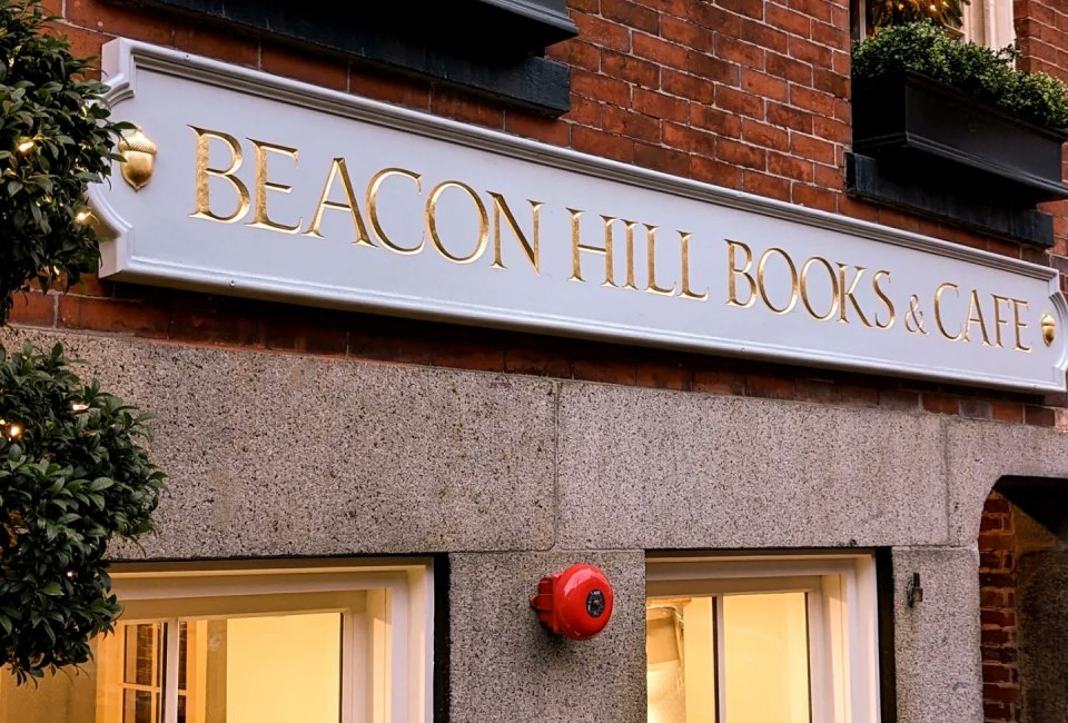 Photo of Beacon Hill Books & Cafe exterior and sign.