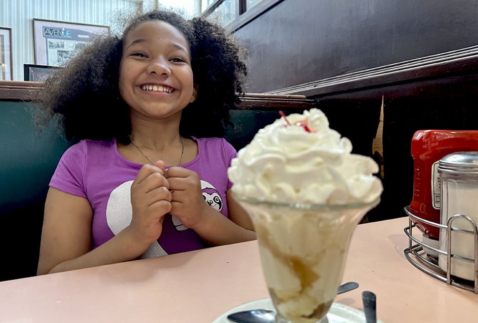 The towering ice cream sundaes at Lexington Candy Shop are guaranteed kid-pleasers. Photo by Jody Mercier