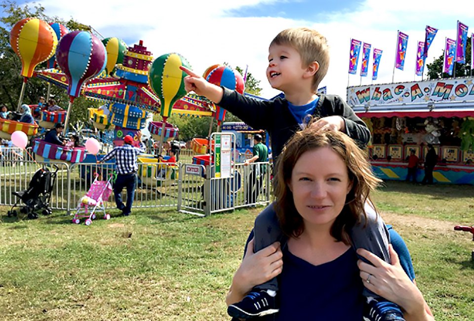 Enjoy the festivities at one of the Queens County Farm's seasonal festivals that bring in kiddie rides, petting zoos, and carnival food. Photo by Mommy Poppins