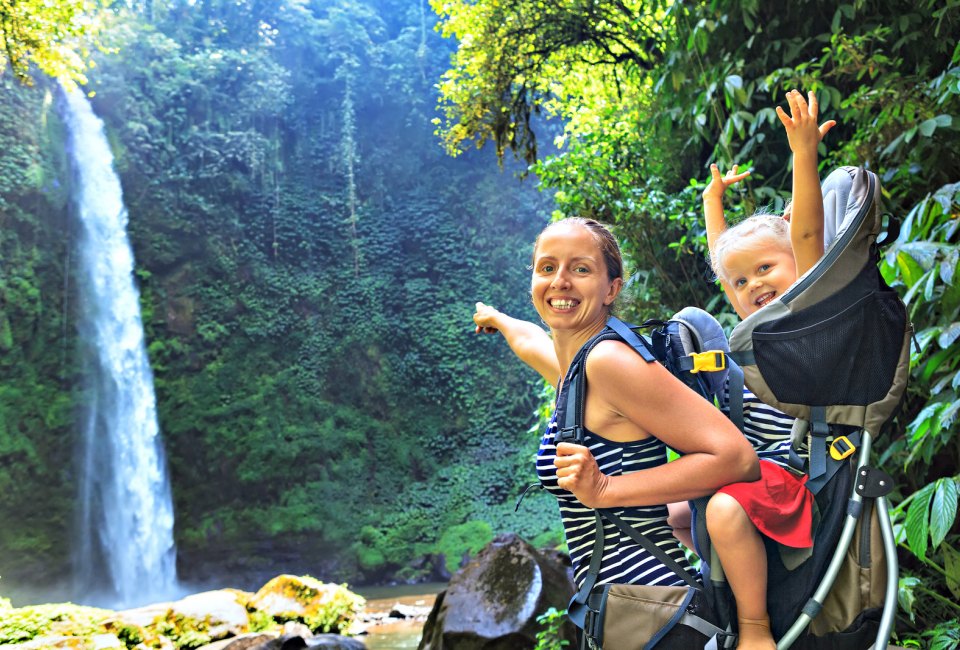 Wander to a local waterfall, with excited kids in tow.