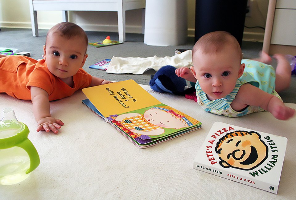 Babies love books; sure they may treat them as toys or food at first, but a love of reading will come.