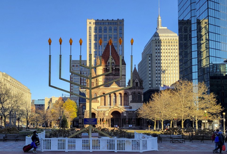 Head to Boston for affordable seasonal fun with the top free Christmas and holiday events for 2024! The menorah in Copley Square. Photo by Leslee/Flickr 2.0