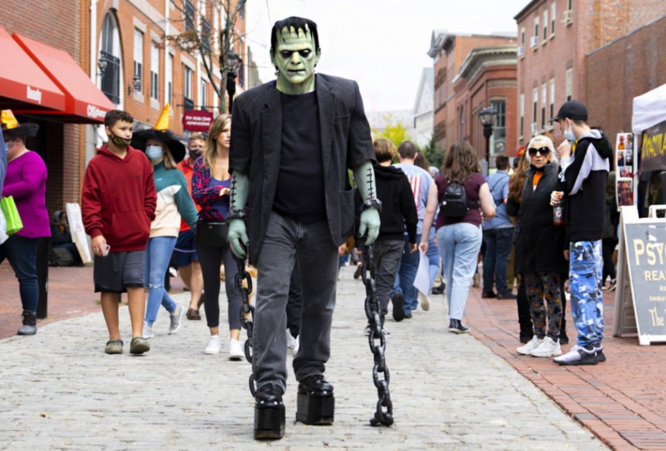 Get out and about to see some great Halloween events for free in 2024! Frankenstein on Essex Street in Salem, photo by Kate Fox.