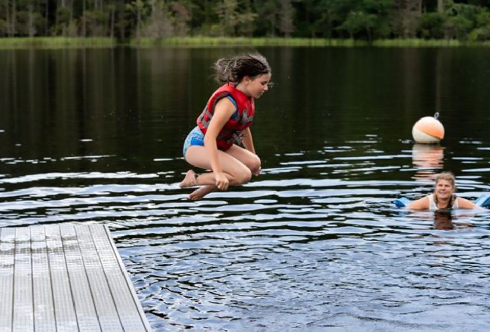 Girls discover the wonders of nature at Camp Amity Acres. Photo courtesy of the camp