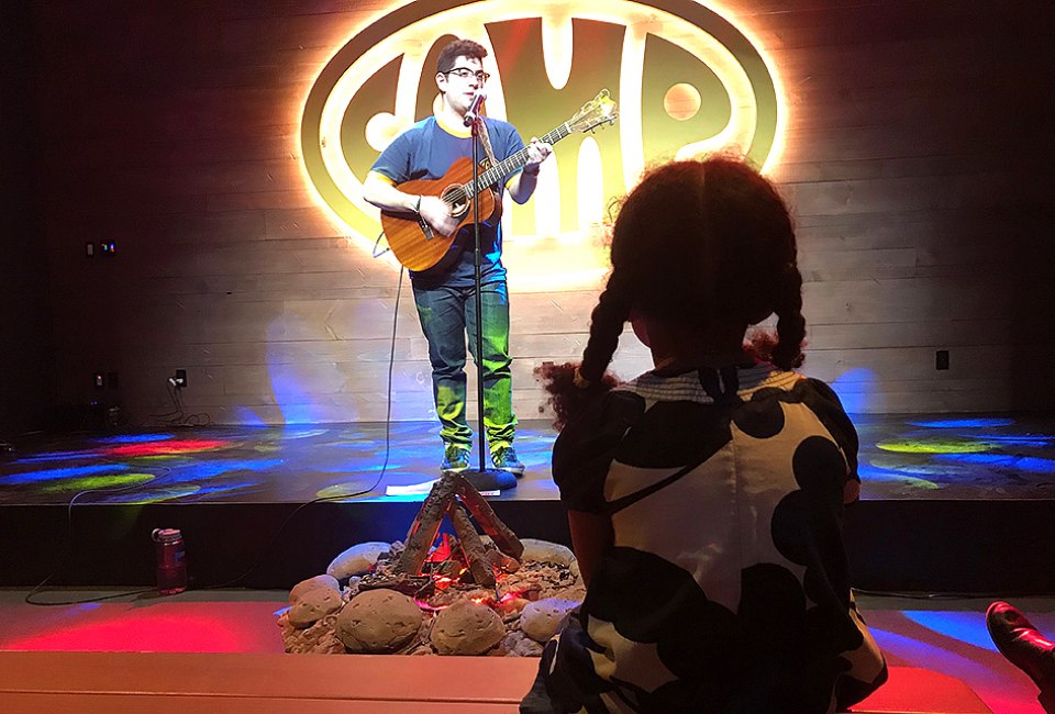 Sing songs around the campfire at the new Camp store in Downtown Brooklyn. Photo by Jody Mercier