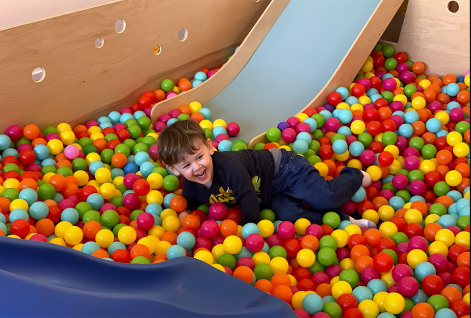 Jump, swim, and slide in the giant ball pit at The Children's Social Club. Photo by the author